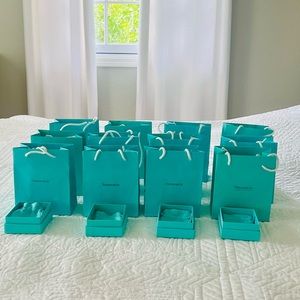 Dozen complete Tiffany gift boxes